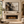 Black and Bronze Distressed Abstract Wall Art styled in a living space