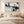 Black and White Splatter Abstract Wall Art styled in a living space