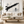 Black Brushstroke on Cream Abstract Wall Art styled in a living space
