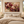 Burgundy Peony Floral Wall Art styled in a living space