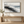 Charcoal Shoreline Seascape Art Print styled in a living space