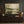 Deep Sage Lake Abstract Landscape Wall Art styled in a living space