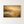 Golden Haze Abstract Landscape Wall Art in a styled room