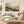 Layered Misty Mountain Ridges Art Print styled in a living space
