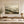 Layered Misty Mountain Ridges Art Print styled in a living space