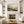 Layered Misty Mountain Ridges Art Print styled in a living space