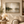 Misty Lake Reflection Wall Art in a styled room