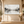 Monochrome Mountain Lake Reflection Wall Art styled in a living space