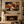 Rust and Black Patchwork Abstract Wall Art styled in a living space