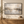 Silver Gray Abstract Lake Wall Art in a styled room