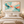 Teal and Coral Abstract Wall Art in a styled room