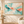 Teal and Coral Abstract Wall Art in a styled room