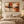 Terracotta and Cream Abstract Wall Art in a styled room